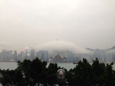 Hong Kong skyline obscured.